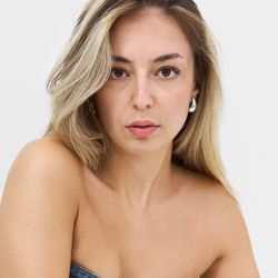 NOELLE M.